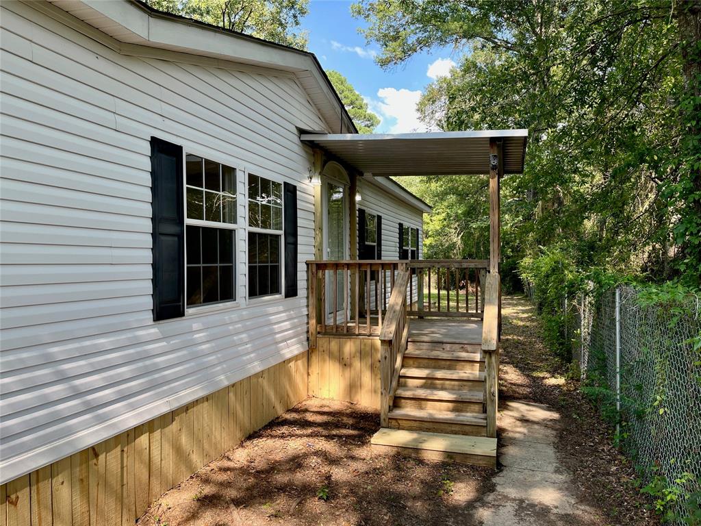 6913 Rice Road Shreveport, LA 71129 - Photo 1 of 26 a view of a house with backyard and porch