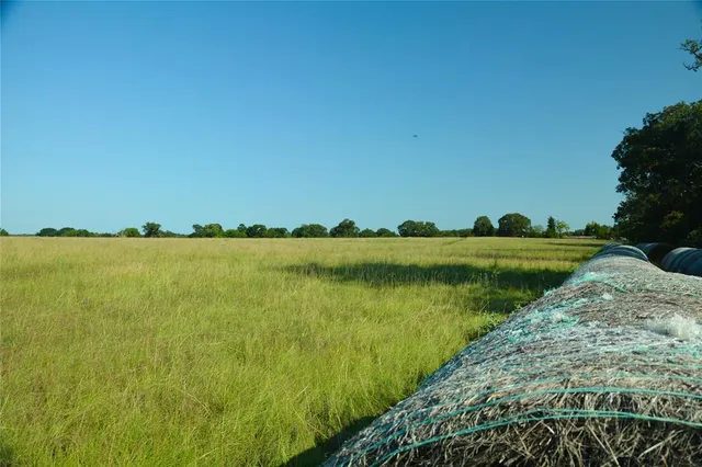 a view of a lake with a big yard