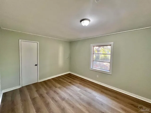 a view of an empty room and window