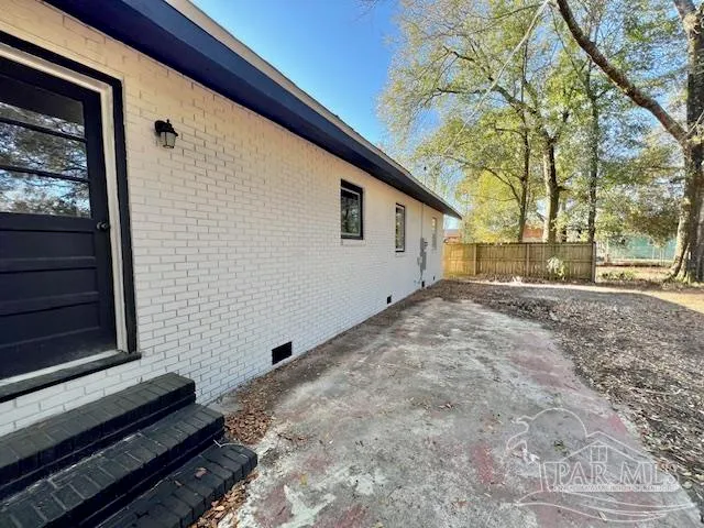 a house view with a backyard
