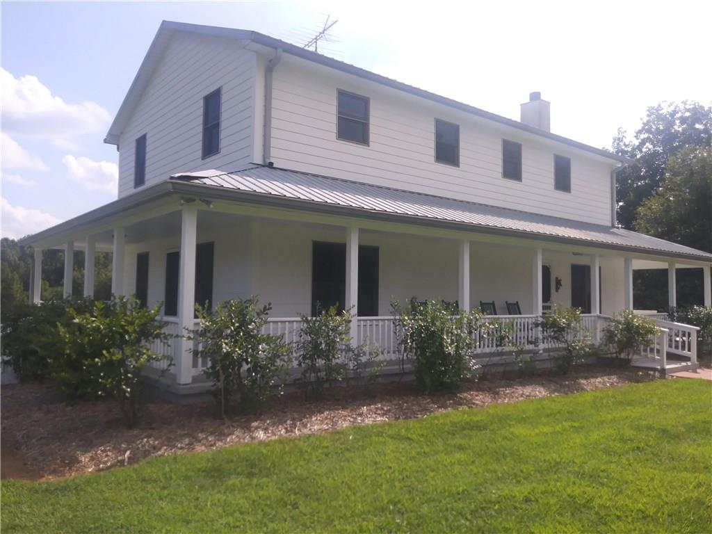 8801 Mull Road Vale, NC 28168 - Photo 2 of 36 a front view of house with yard and outdoor seating