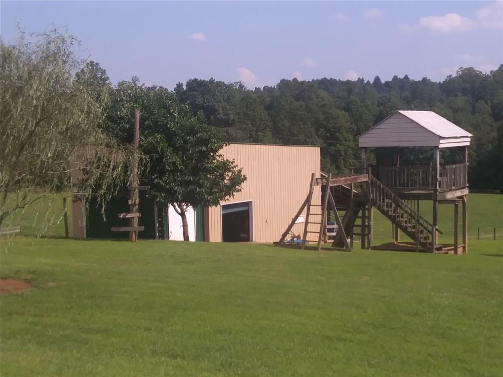 8801 Mull Road Vale, NC 28168 - Photo 25 of 36 a view of a house with a yard