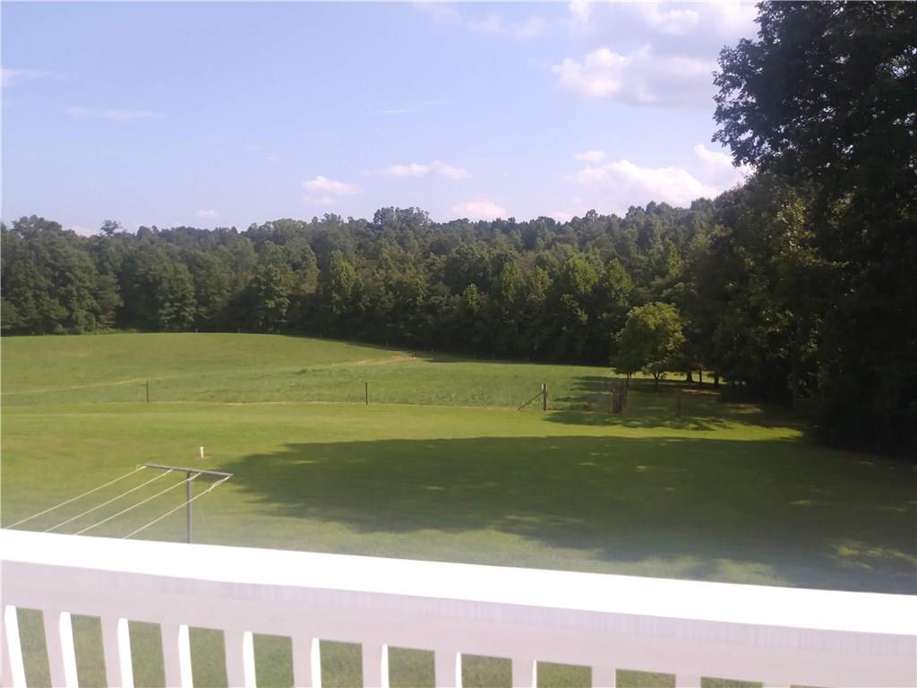 8801 Mull Road Vale, NC 28168 - Photo 33 of 36 a view of a swimming pool and mountains in the background