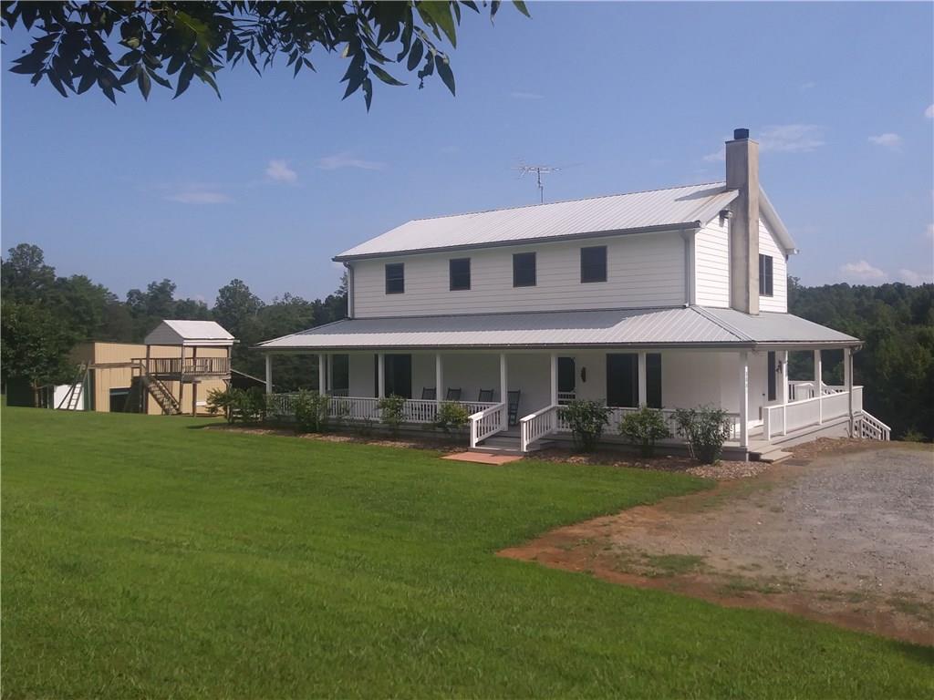 8801 Mull Road Vale, NC 28168 - Photo 36 of 36 a front view of a house with garden