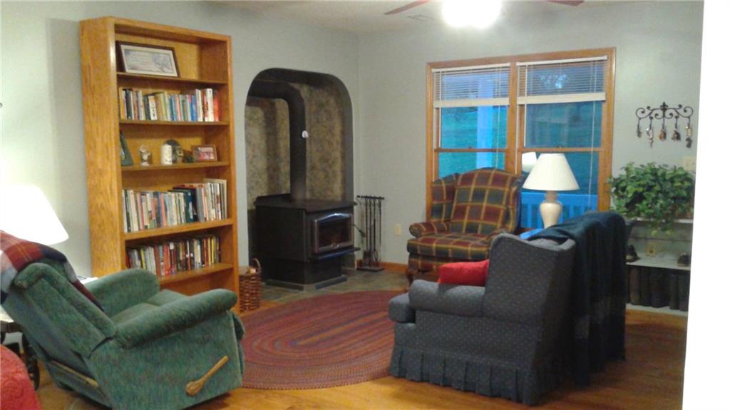 8801 Mull Road Vale, NC 28168 - Photo 5 of 36 a living room with furniture and a book shelf
