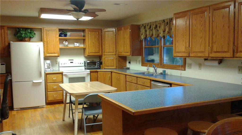 8801 Mull Road Vale, NC 28168 - Photo 7 of 36 a kitchen with stainless steel appliances granite countertop a sink a stove and a refrigerator