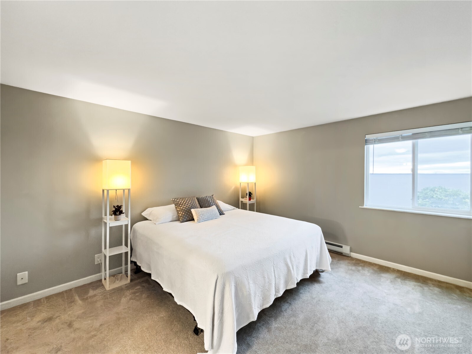 444 South State Street, Unit 307 Bellingham, WA 98225 - Photo 14 of 34 a bedroom with a bed and a window