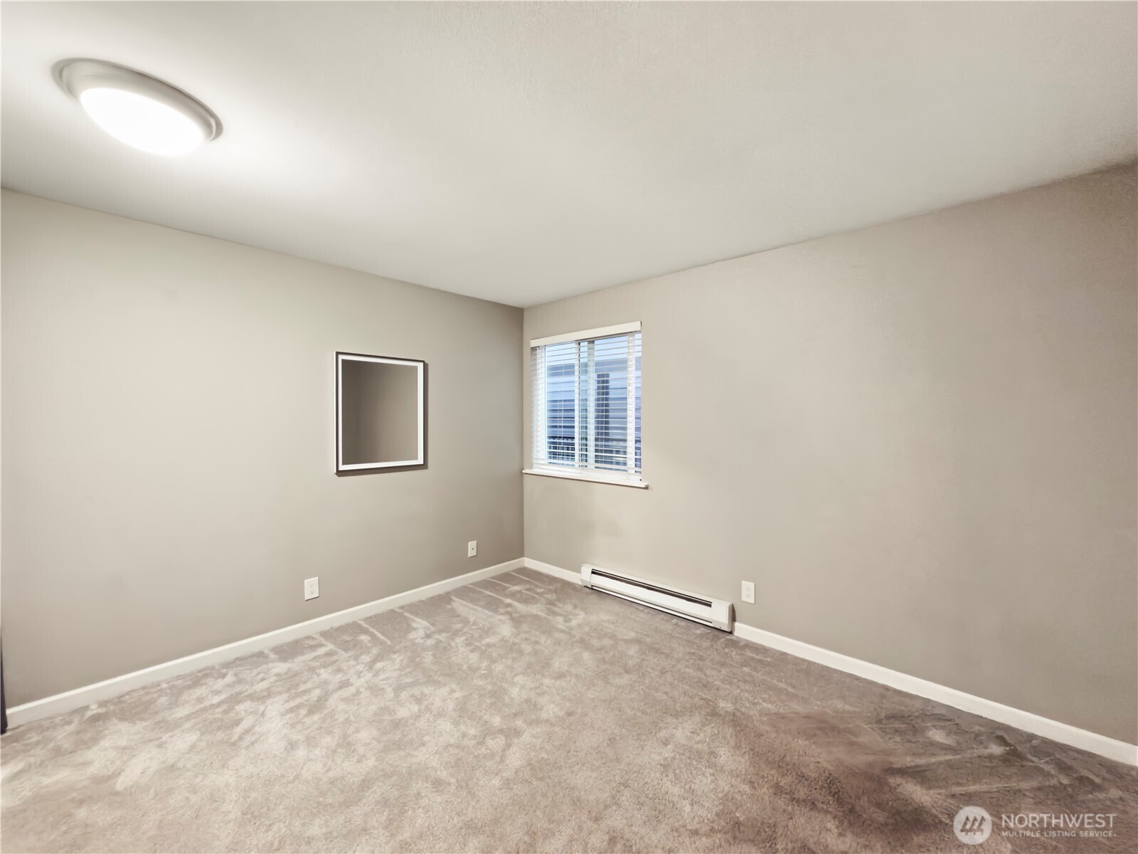 444 South State Street, Unit 307 Bellingham, WA 98225 - Photo 24 of 34 an empty room with a window