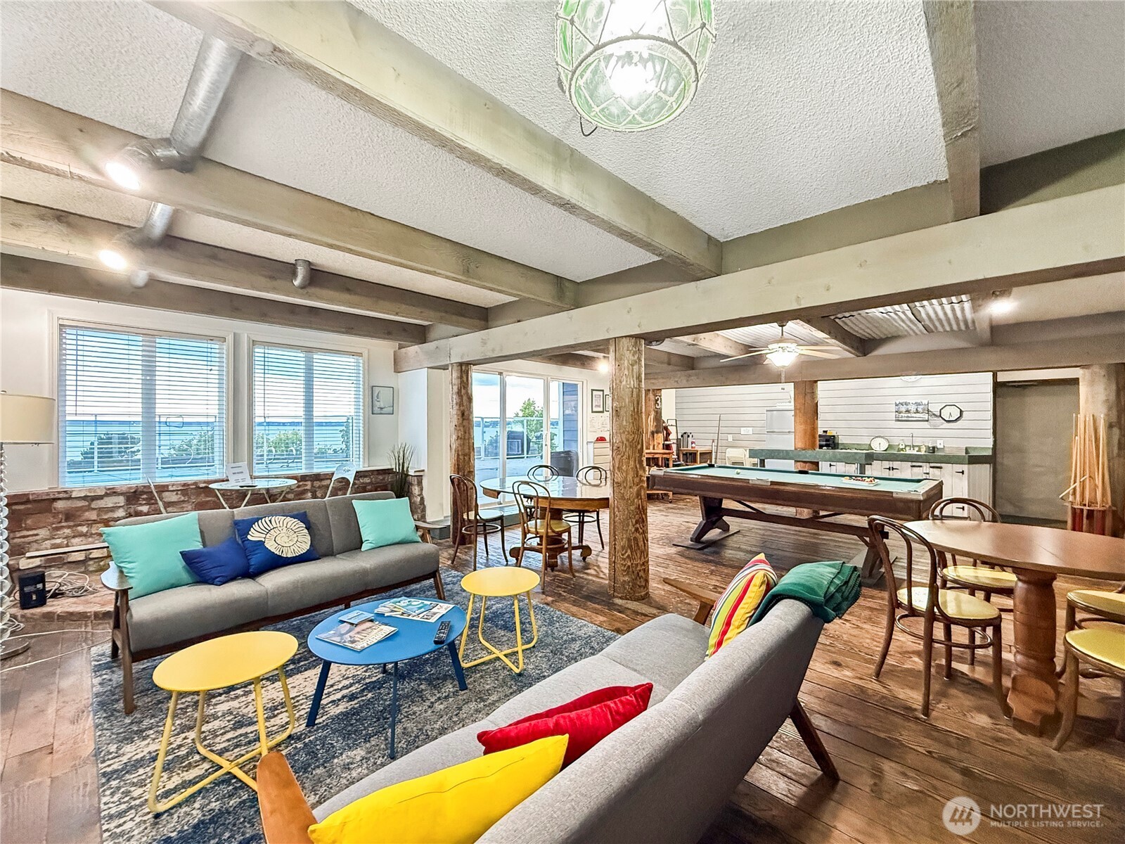 444 South State Street, Unit 307 Bellingham, WA 98225 - Photo 26 of 34 a living room with furniture and a table