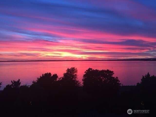 444 South State Street, Unit 307 Bellingham, WA 98225 - Photo 34 of 34 a sunset view with a lake