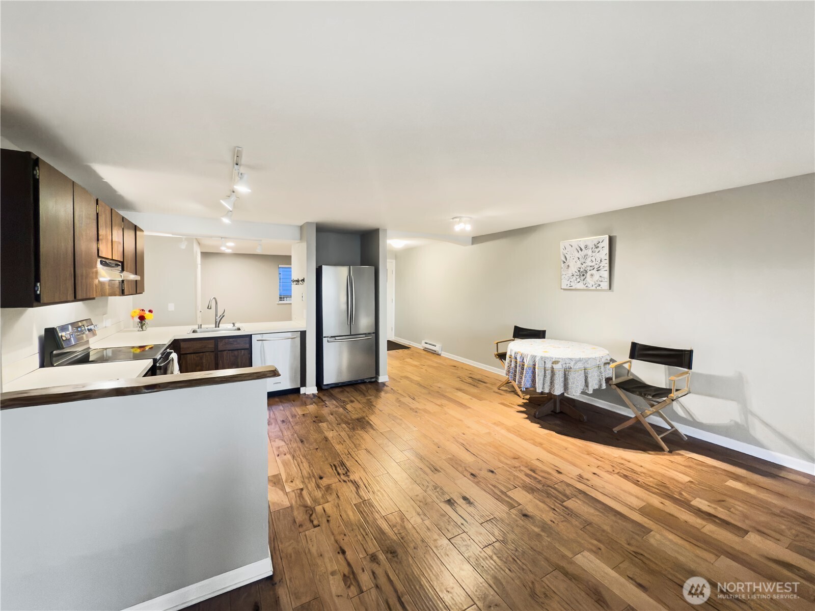 444 South State Street, Unit 307 Bellingham, WA 98225 - Photo 7 of 34 a kitchen with stainless steel appliances a refrigerator and a stove top oven