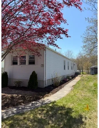a house view with a backyard space