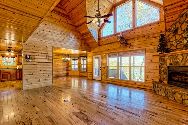 a kitchen with lots of counter top space and stainless steel appliances