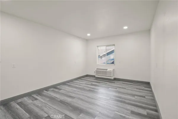 a view of an empty room and window