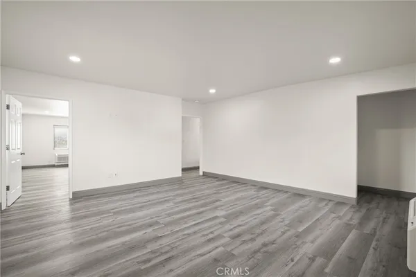 a kitchen with stainless steel appliances a refrigerator stove and sink