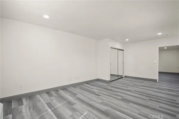 a bathroom with a sink and a glass door shower