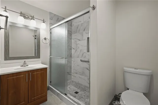 a view of wooden floor and windows in a room