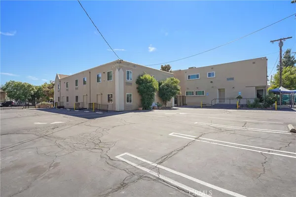 a view of a house with a street
