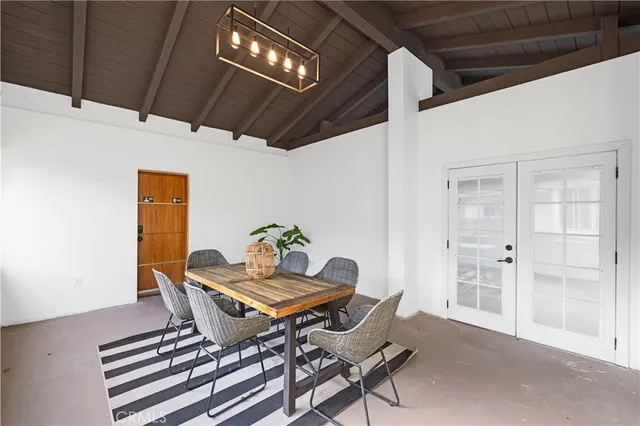 a workspace room with furniture and wooden floor