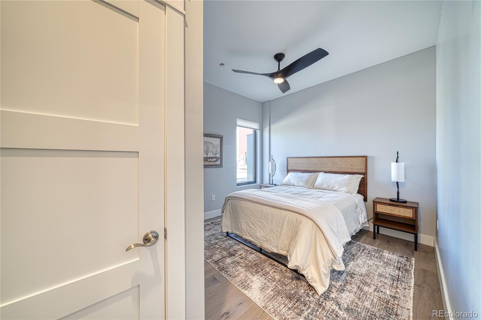 136 Old Stage Road, Unit 1B Salida, CO 81201 - Photo 17 of 24 a bedroom with a bed and a window