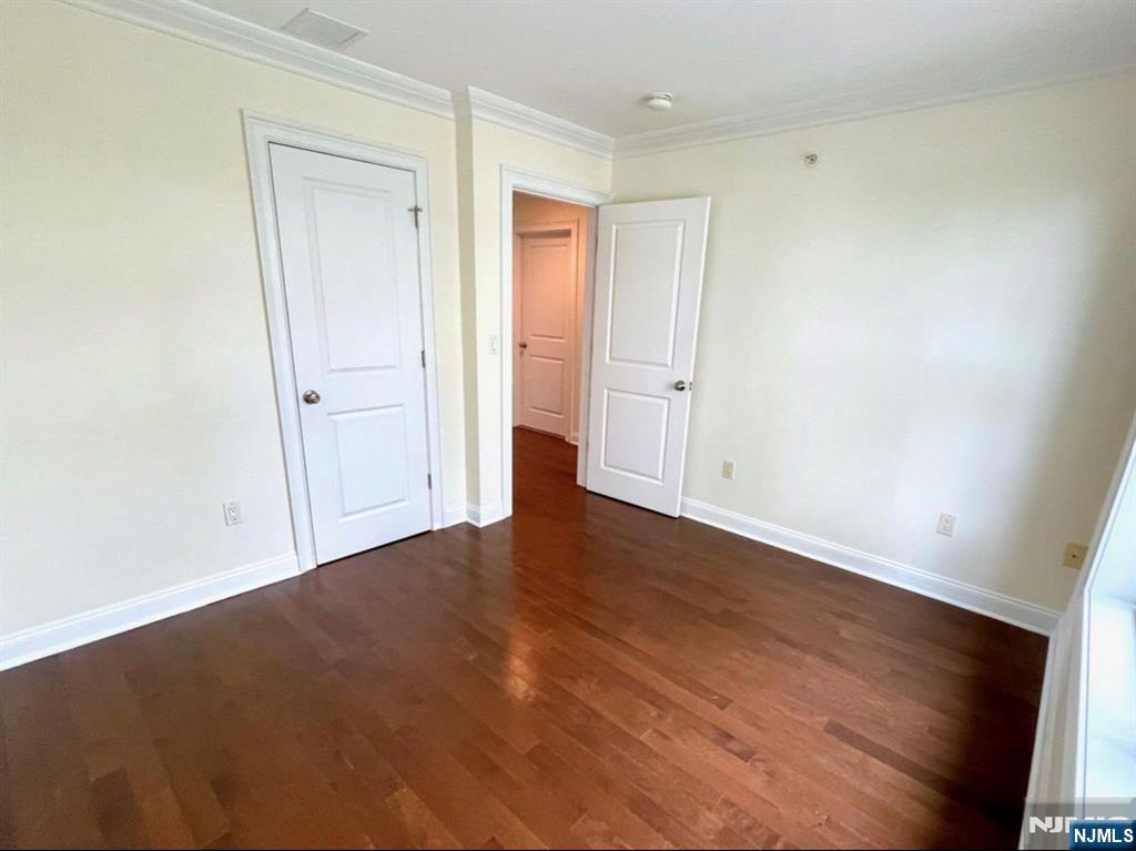 1625 Paterson Plank Road, Unit 18 Secaucus, NJ 07094 - Photo 18 of 23 wooden floor in an empty room