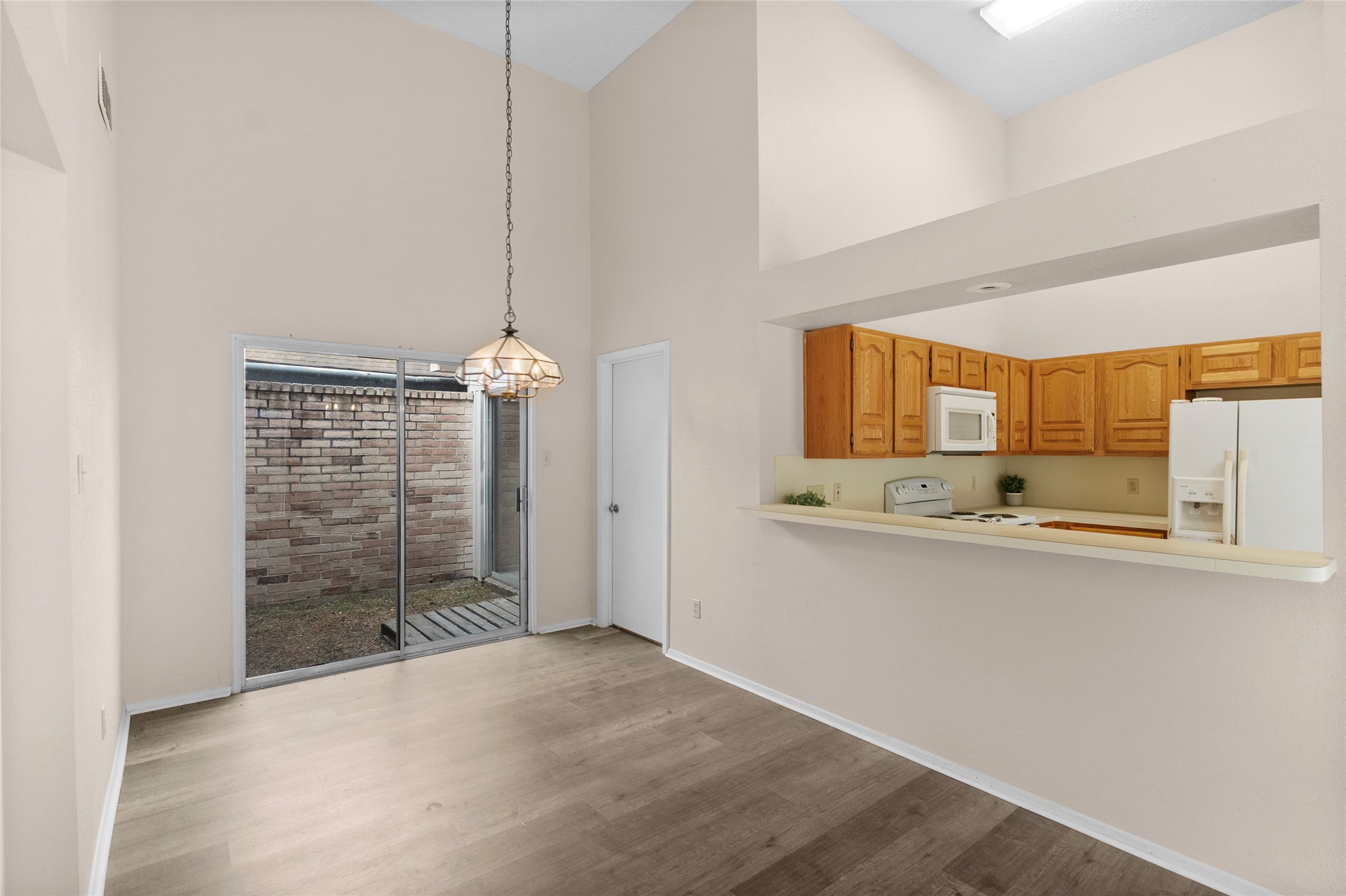 13222 Maplecrest Drive Houston, TX 77041 - Photo 12 of 31 a view of a room with window and cabinet