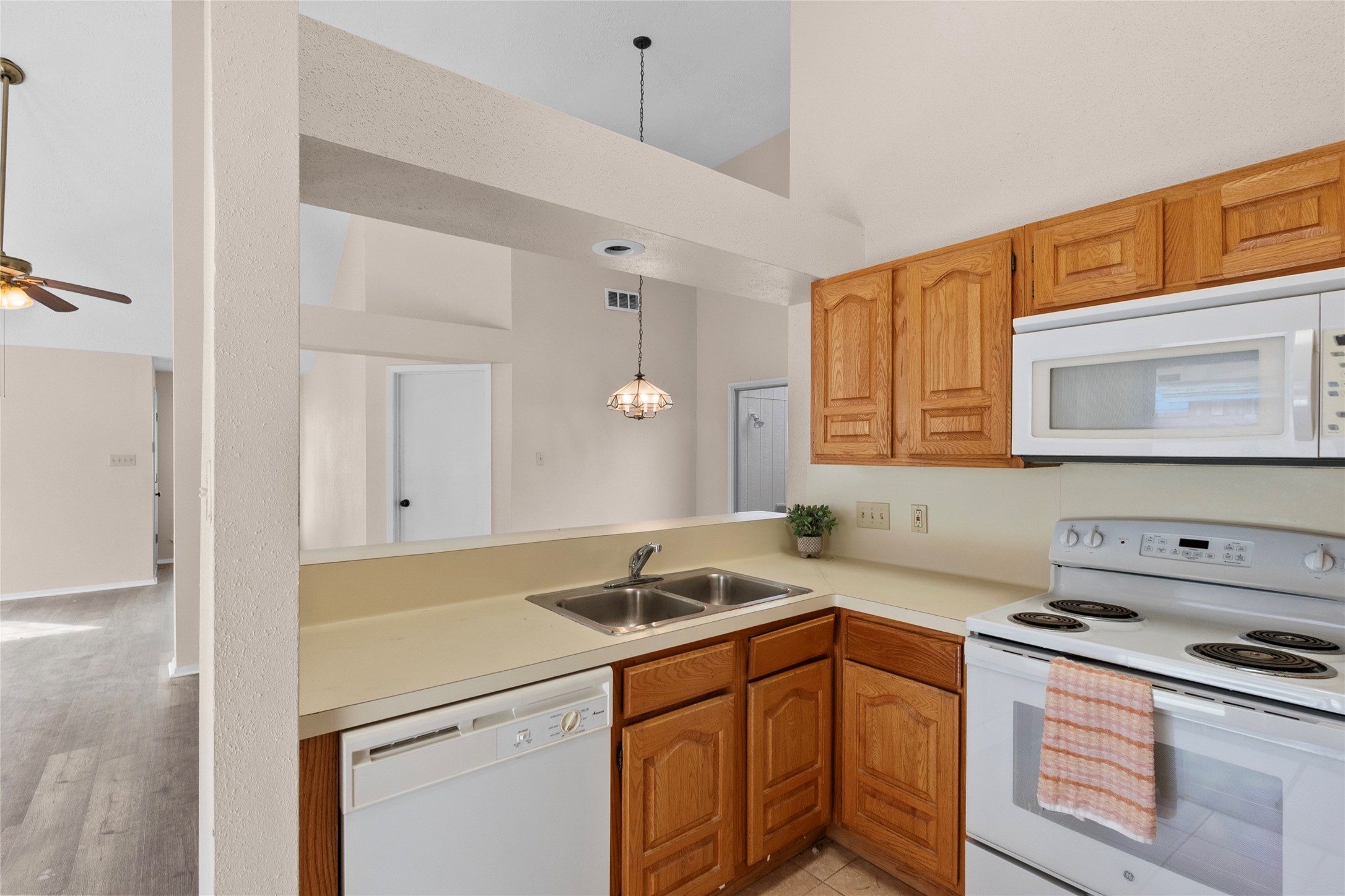 13222 Maplecrest Drive Houston, TX 77041 - Photo 15 of 31 a kitchen with stainless steel appliances granite countertop a sink and a stove
