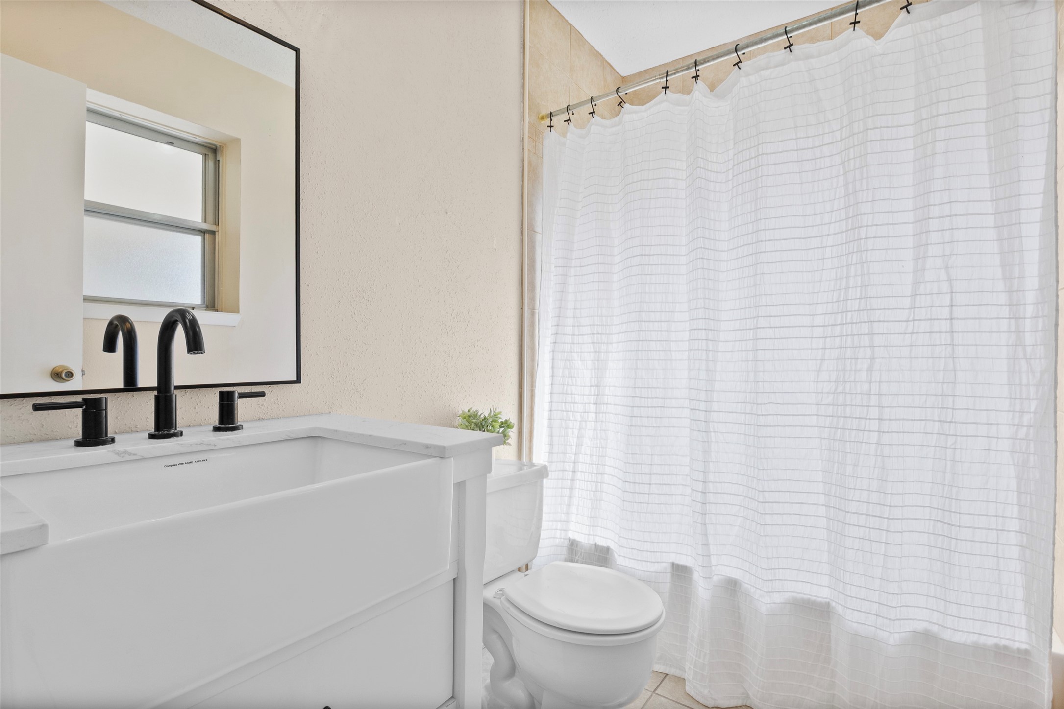 13222 Maplecrest Drive Houston, TX 77041 - Photo 20 of 31 a bathroom with a sink a toilet and shower