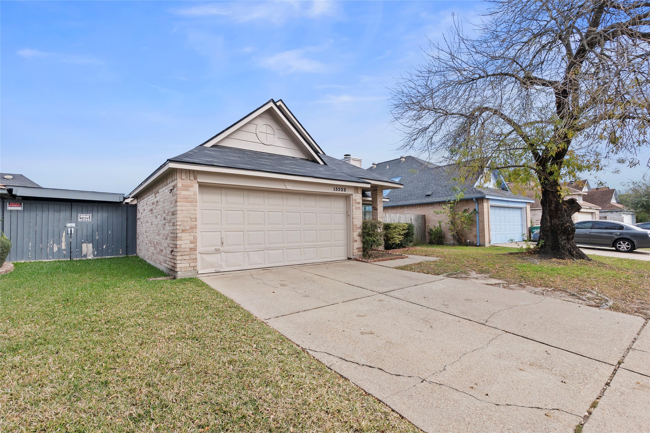 13222 Maplecrest Drive Houston, TX 77041 - Photo 2 of 31 a front view of a house with a yard and garage