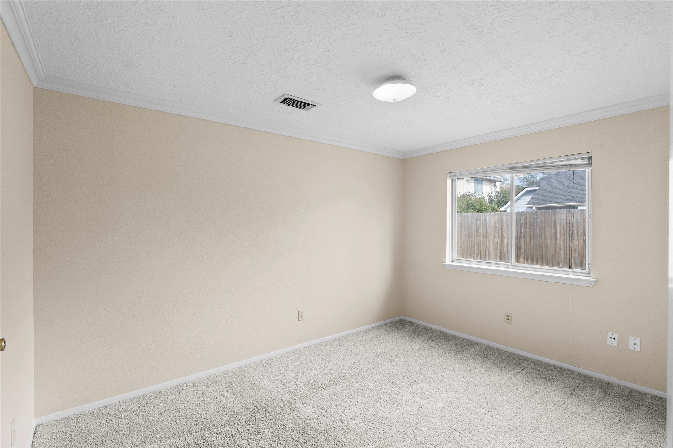 13222 Maplecrest Drive Houston, TX 77041 - Photo 21 of 31 an empty room with windows