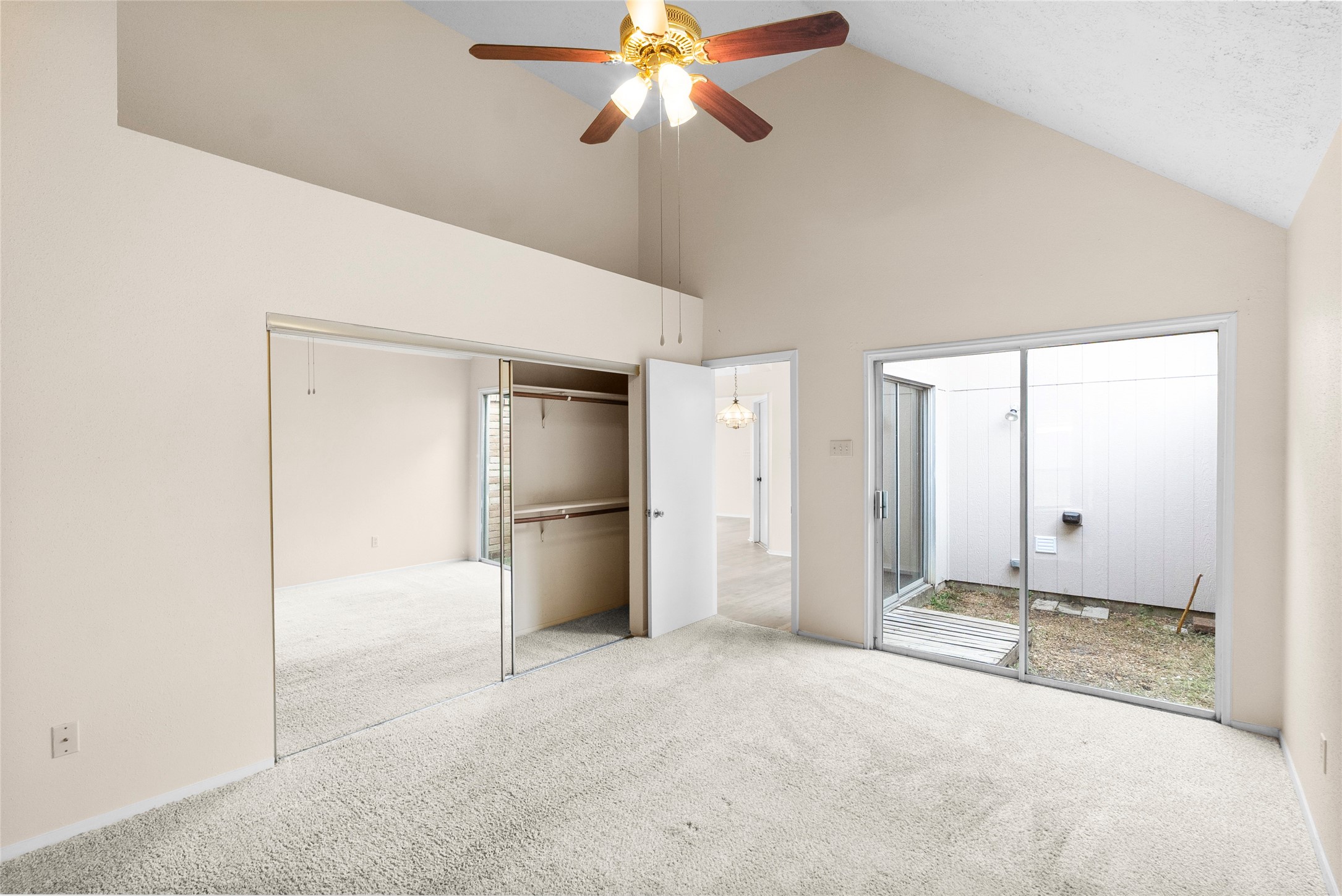 13222 Maplecrest Drive Houston, TX 77041 - Photo 23 of 31 a view of empty room with window and ceiling fan