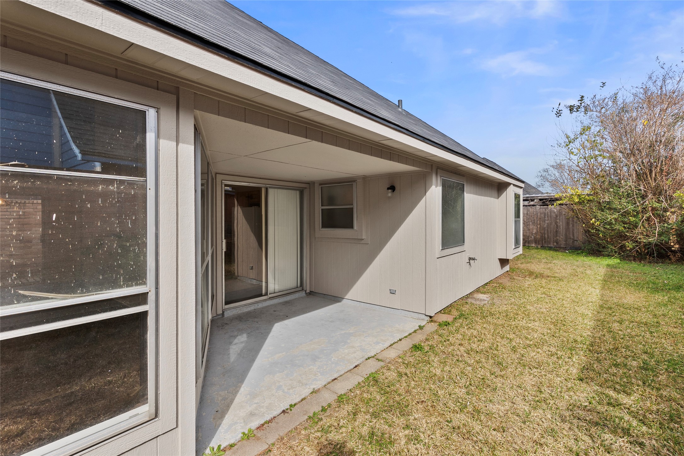 13222 Maplecrest Drive Houston, TX 77041 - Photo 26 of 31 a view of backyard with large trees and plants