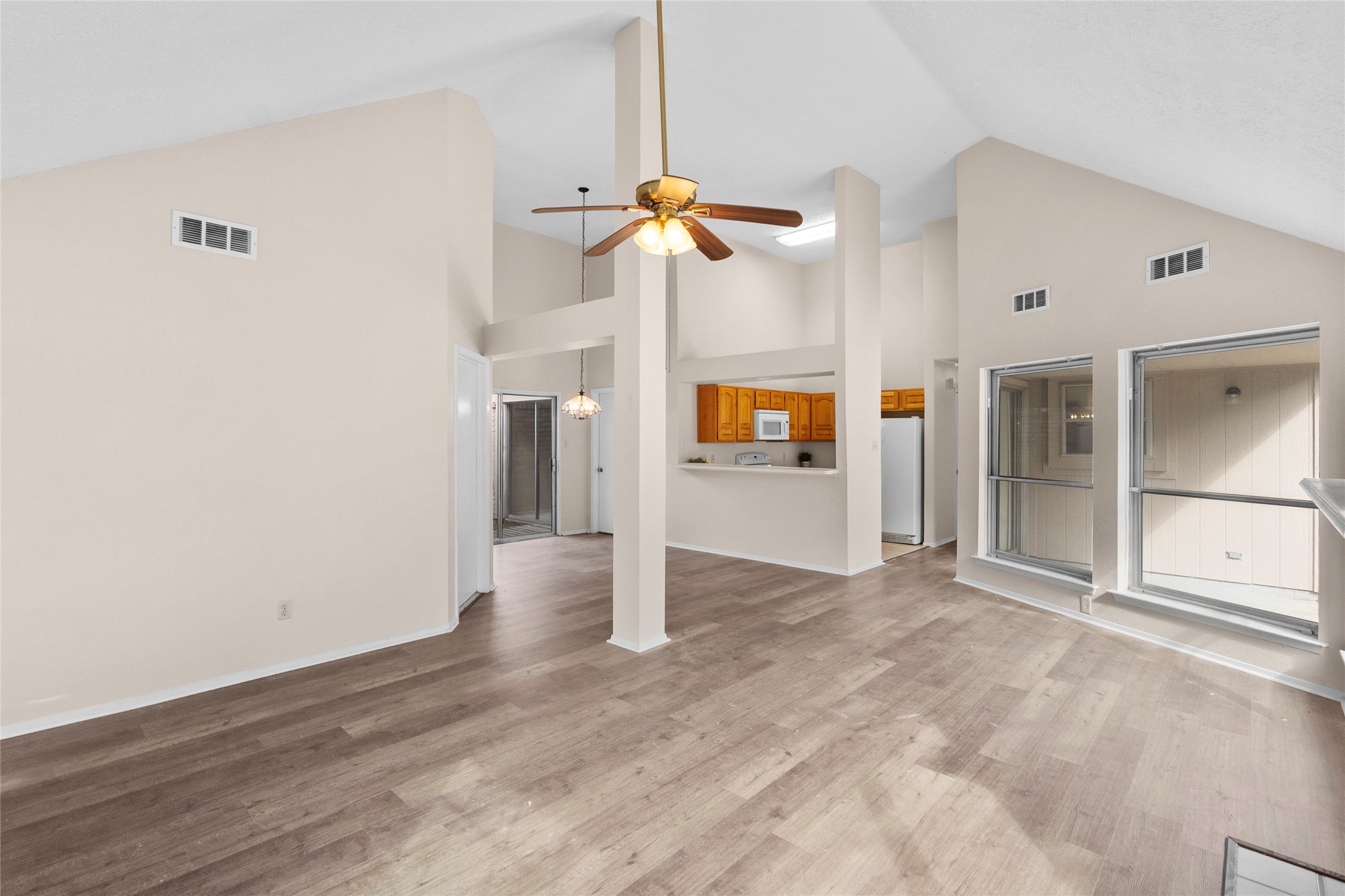 13222 Maplecrest Drive Houston, TX 77041 - Photo 10 of 31 a view of empty room with wooden floor