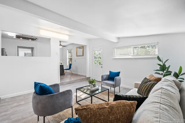 a living room with furniture and a couch