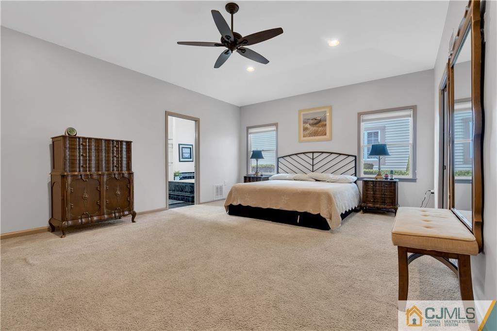 45 Harwood Road Monroe Township, NJ 08831 - Photo 23 of 35 a spacious bedroom with a bed and a cabinets