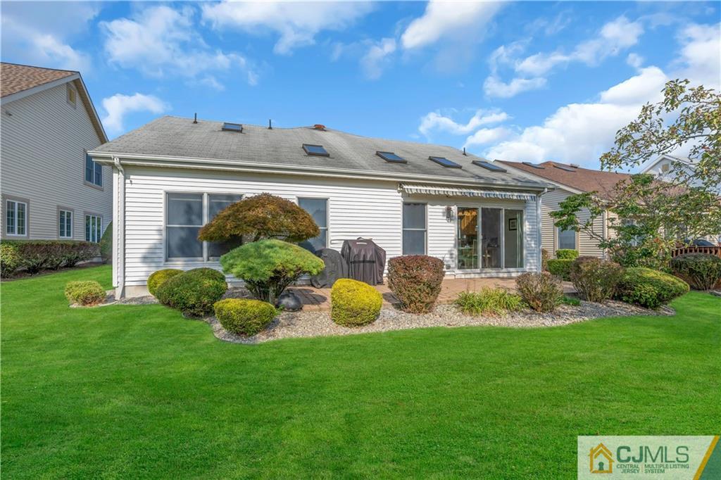 45 Harwood Road Monroe Township, NJ 08831 - Photo 35 of 35 a view of a house with backyard and garden