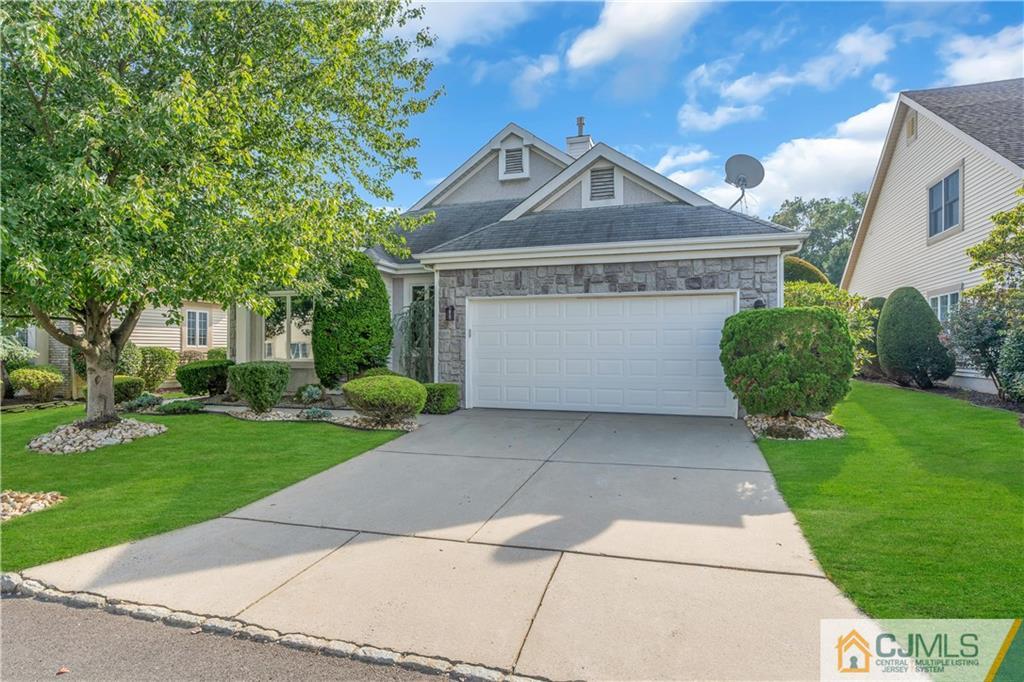 45 Harwood Road Monroe Township, NJ 08831 - Photo 7 of 35 a front view of a house with a yard