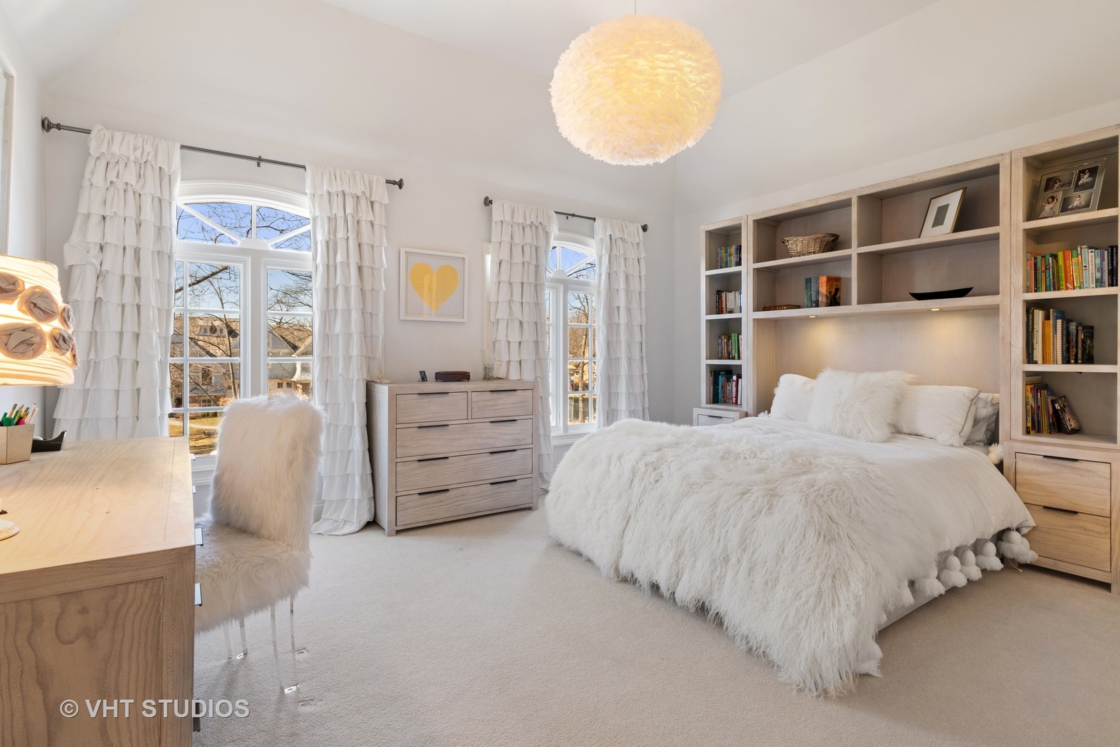 795 Grove Street Glencoe, IL 60022 - Photo 24 of 38 a spacious bedroom with a bed and a window
