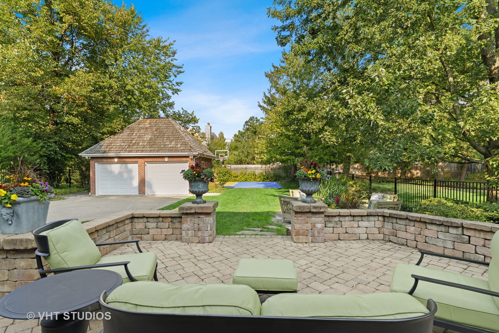 795 Grove Street Glencoe, IL 60022 - Photo 30 of 38 a view of a patio with couches table and chairs and potted plants