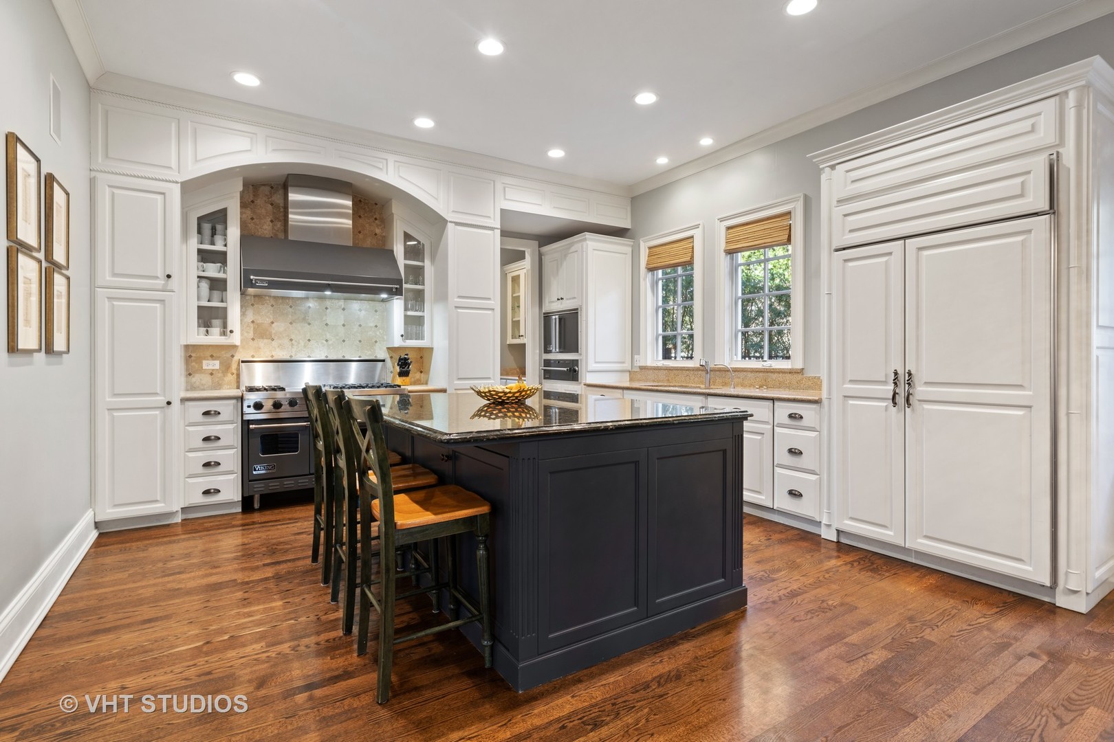 795 Grove Street Glencoe, IL 60022 - Photo 8 of 38 a kitchen with stainless steel appliances granite countertop a stove a sink and a refrigerator