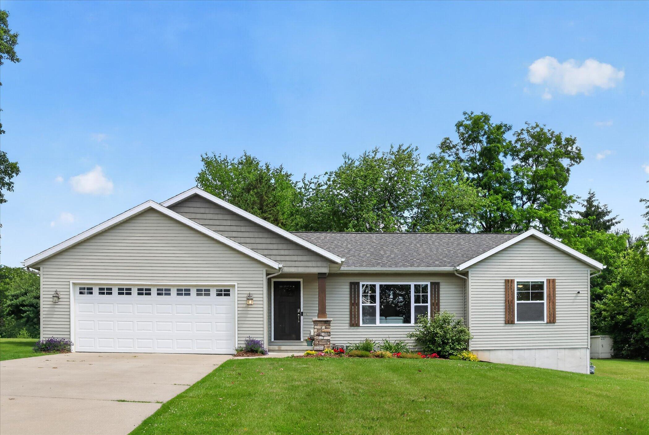 2747 4 Mile Road Northwest Grand Rapids, MI 49544 - Photo 1 of 48 Front of Home