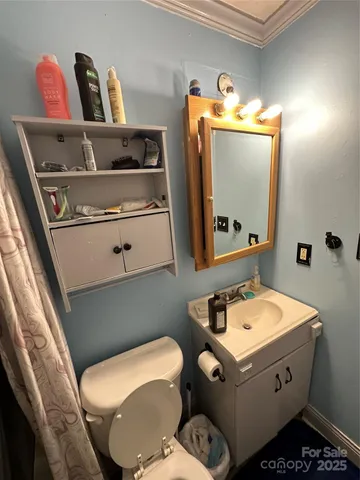 a kitchen with sink refrigerator and stove