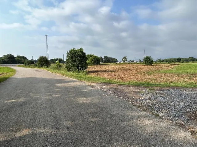 a view of a lake with a big yard
