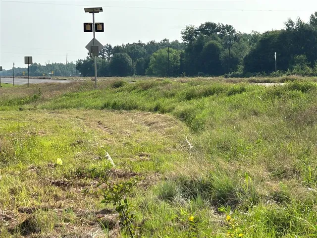 a view of a lake with a big yard