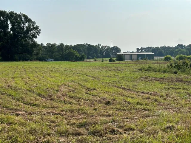 a view of a lake and green space