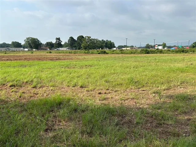 a view of a lake with an outdoor space