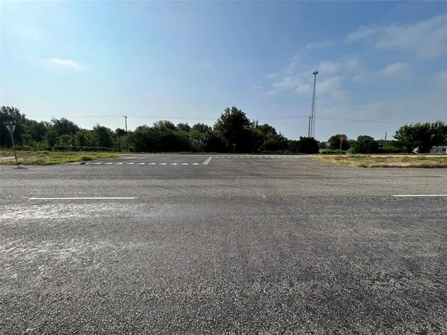 a view of a garden and basketball court
