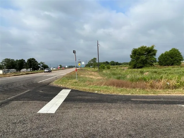 a view of a yard with an ocean