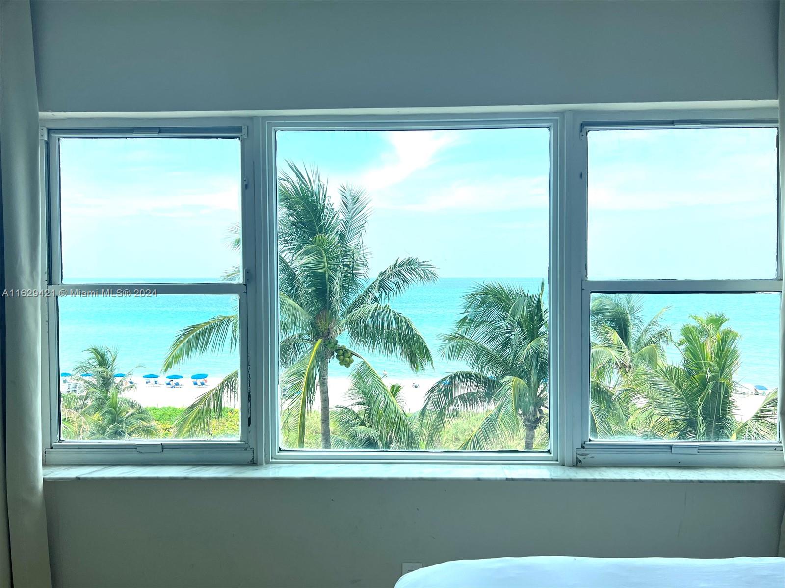 6345 Collins Avenue, Unit 635 Miami Beach, FL 33141 - Photo 3 of 28 a view of a room that has a large window and front view