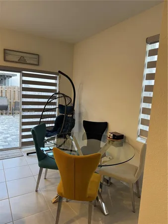 a view of a workspace with furniture